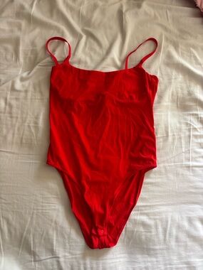 Sleek Red Scoop-Neck Bodysuit with Adjustable Straps